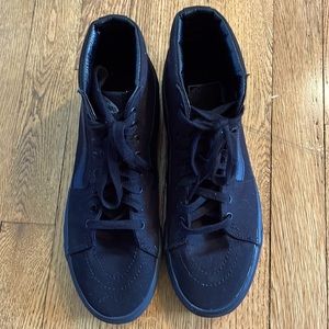 Vans black high tops in a mens size 8.